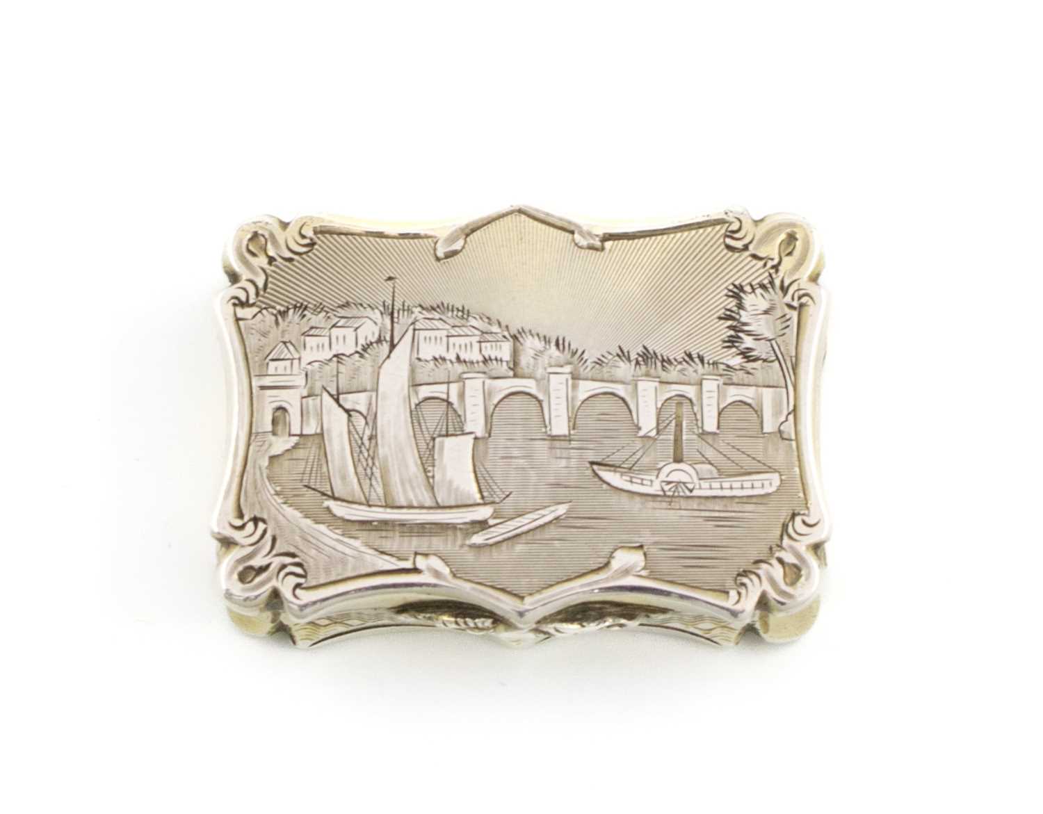 A Victorian silver vinaigrette, by Nathaniel Mills, Birmingham 1846, shaped rectangular form, with