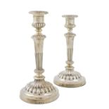 A pair of George III silver candlesticks, by Matthew Boulton, Birmingham 1810, circular tapering