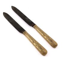 A pair of George III silver-gilt handled King's Pattern carving knives, by Paul Storr, London