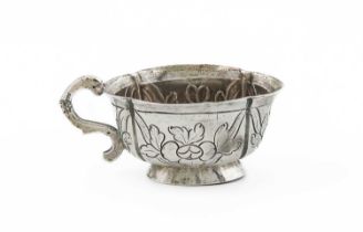 An 18th century Russian silver vodka cup, Moscow 1782, oval lobed from, foliate decoration, scroll
