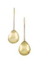 A pair of Elizabeth I silver-gilt Lion Sejant spoons, by William Cawdell, London 1598, later gilded,