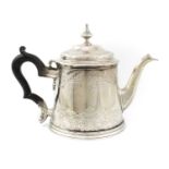 A George IV silver teapot, by John Edward Terry, London 1820, circular tapering form, engraved