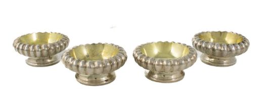 A set of four George III Irish silver salt cellars, possibly by Christopher Haines, Dublin 1810,