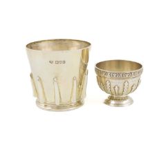 An Edwardian silver beaker, by Goldsmiths & Silversmiths Co, London 1909, plain circular tapering