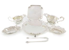 A mixed lot of silver items, comprising: a Victorian square waiter, by Lambert & Co, London 1880,