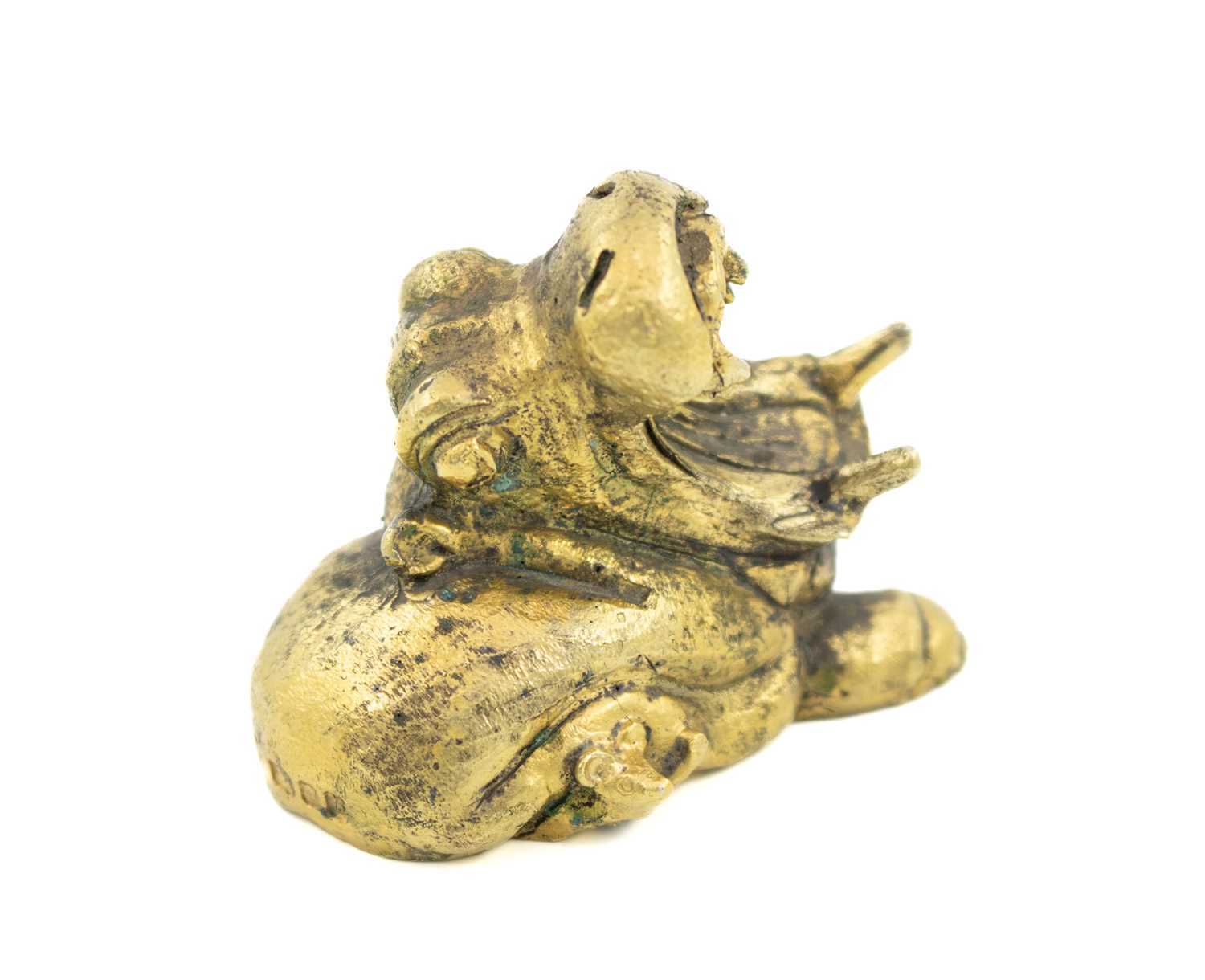 By Stuart Devlin, a modern silver-gilt hippo, London 1976, modelled as a hippo sitting on a mouse,