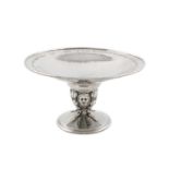 By Omar Ramsden, an Arts & Craft silver tazza, London 1928, also engraved 'Omar Ramsden Me Fecit',