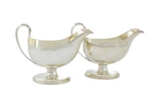 A pair of George III silver sauceboats, by Henry Chawner, London 1794, oval form, reeded borders,