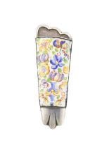 A silver and enamel posy holder, unmarked, tapering oval form, plain mounts the front mounted with