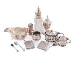 A mixed lot of silver items, comprising: two vesta cases, two mustard pots, two pepper pots, a sugar