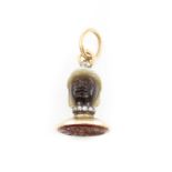 A George III gold-mounted agate fob seal, unmarked, carved as a male head wearing a Moorish