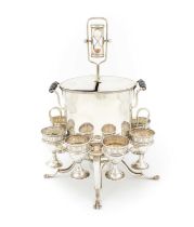 A George III old Sheffield plated egg coddler and eight egg cups, unmarked, circa 1800, oval form