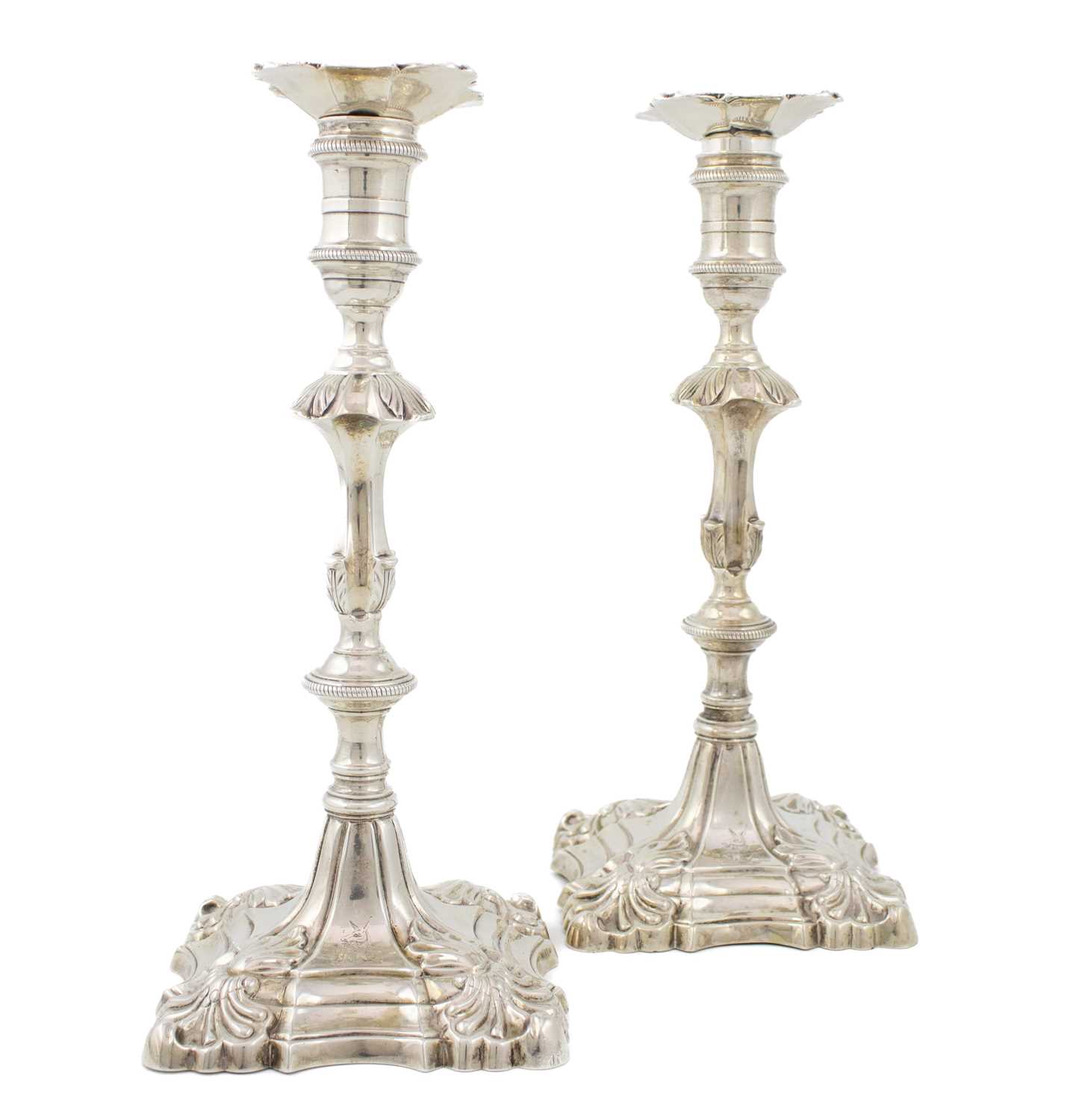 A pair of George III silver candlesticks, by William Cafe, London 1766, knopped tapering stem,