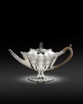 A fine George III silver teapot, by Charles Aldridge, London 1789, bat-wing panelled shaped oval