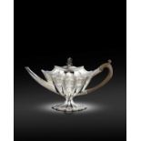 A fine George III silver teapot, by Charles Aldridge, London 1789, bat-wing panelled shaped oval