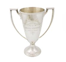 An American presentation silver two-handled cup, by Gorham and Co. retailed by W. Wise and Son,