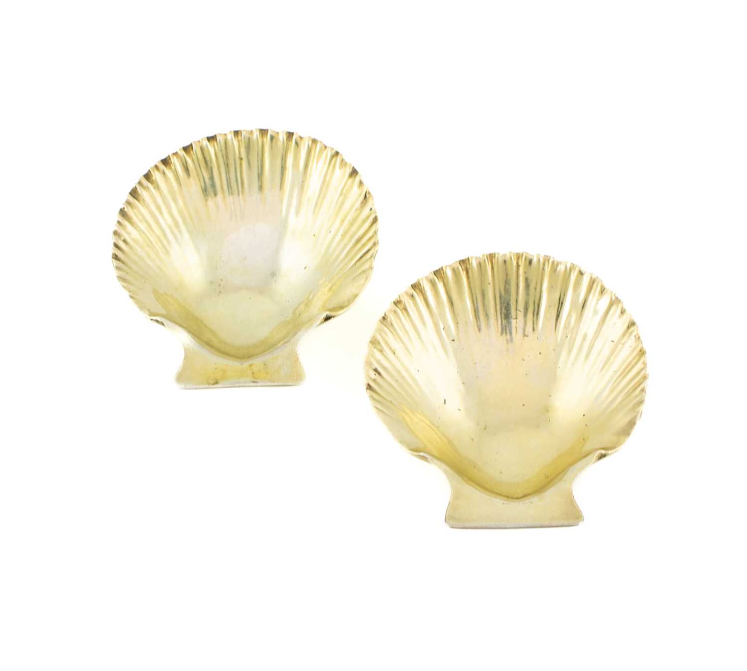 A pair of Victorian cast silver-gilt caddy spoons, by Samuel Webster, London 1846, scallop shell