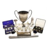 A mixed lot of silver items, various dates and makers, comprising: a two-handled trophy, a two-