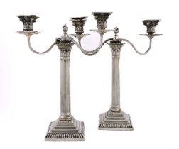 A pair of late Victorian silver candelabra, by Hawksworth, Eyre & Co Ltd, Sheffield 1894, fluted