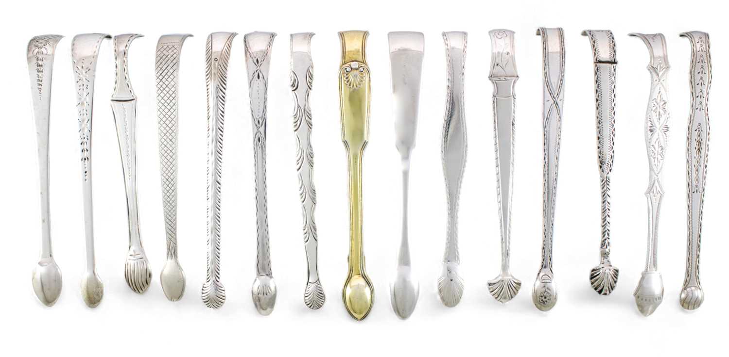 A collection of fifteen pairs of George III silver sugar tongs, various dates and makers,