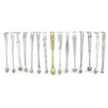 A collection of fifteen pairs of George III silver sugar tongs, various dates and makers,