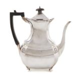 An Edwardian silver coffee pot, by Edward Barnard & Sons Ltd, London 1905, faceted oblong bellied