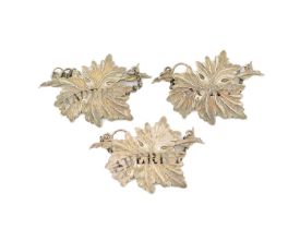 A set of three William IV silver wine labels, by Willmore & Co, Birmingham 1835, vine leaf form,