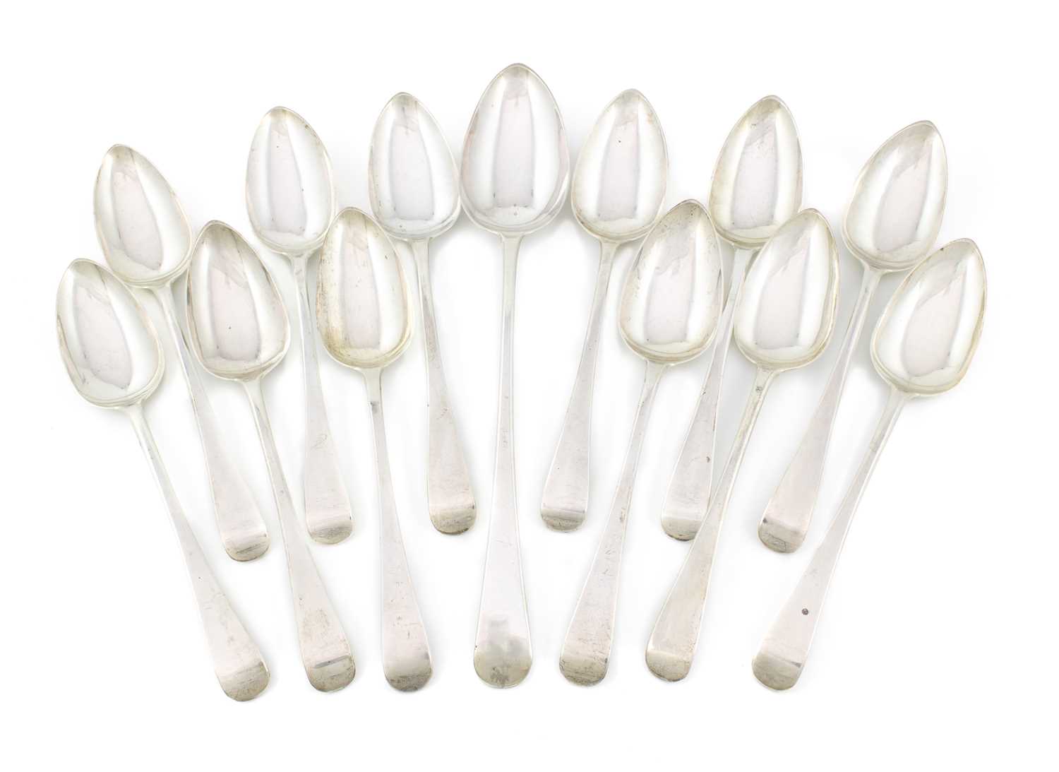 A matched set of twelve George III silver Old English pattern tablespoons. by Richard Crossley &