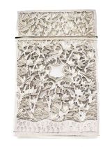 An Indian silver card case, unmarked, rectangular form, embossed and chased with foliate and bird
