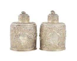 A pair of George III silver tea caddies, by Samuel Hennell, London 1819, oblong forms, embossed