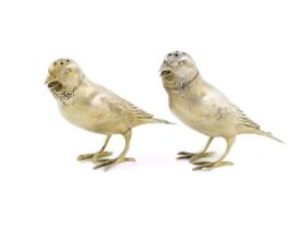 A pair of Victorian silver-gilt novelty bird peppers, by James Barclay Hennell, London 1879,