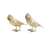A pair of Victorian silver-gilt novelty bird peppers, by James Barclay Hennell, London 1879,