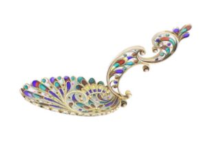 A continental silver-gilt and plique-a-jour enamel caddy spoon, oval bowl, rope-work borders, scroll