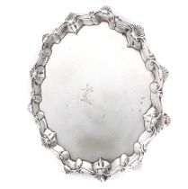 A George III silver salver, by Ebenezer Coker, London 1766, circular form, a moulded shell and