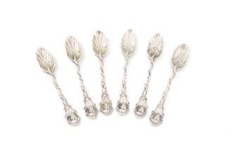 A set of six 18th century cast silver teaspoons, unmarked, circa 1750, the terminals with female