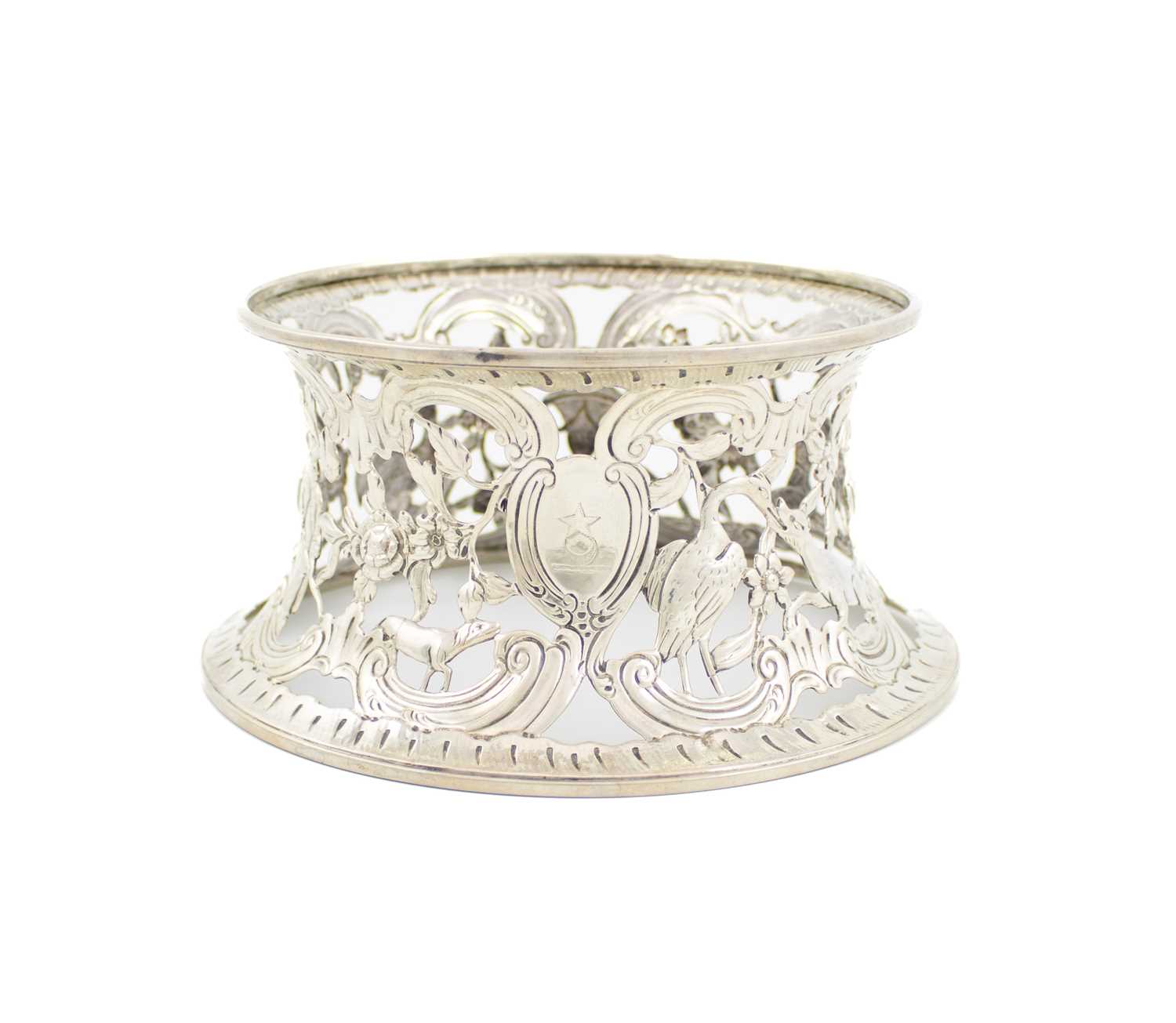 A George II Irish silver dish ring, maker's mark E.B circa 1750, tapering circular form, pierced and