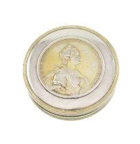 An 18th century Russian silver parcel-gilt silver snuff box, unmarked, circa 1775, circular form