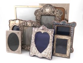 A mixed lot of silver photograph frames, various dates and makers, comprising: one of arched