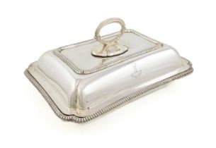 A silver entree dish and cover, by Thomas Bradbury and Sons, Sheffield 1923, shaped rectangular