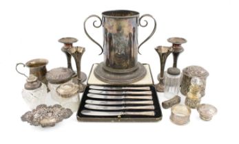 A mixed lot of silver items, comprising: a pair of candlesticks, Birmingham 1901, a mug, a pair of