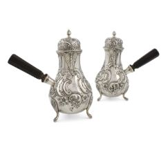 A matched pair of Victorian/Edwardian silver cafe au lait pots, by Sibray, Hall & Co and Sibray,