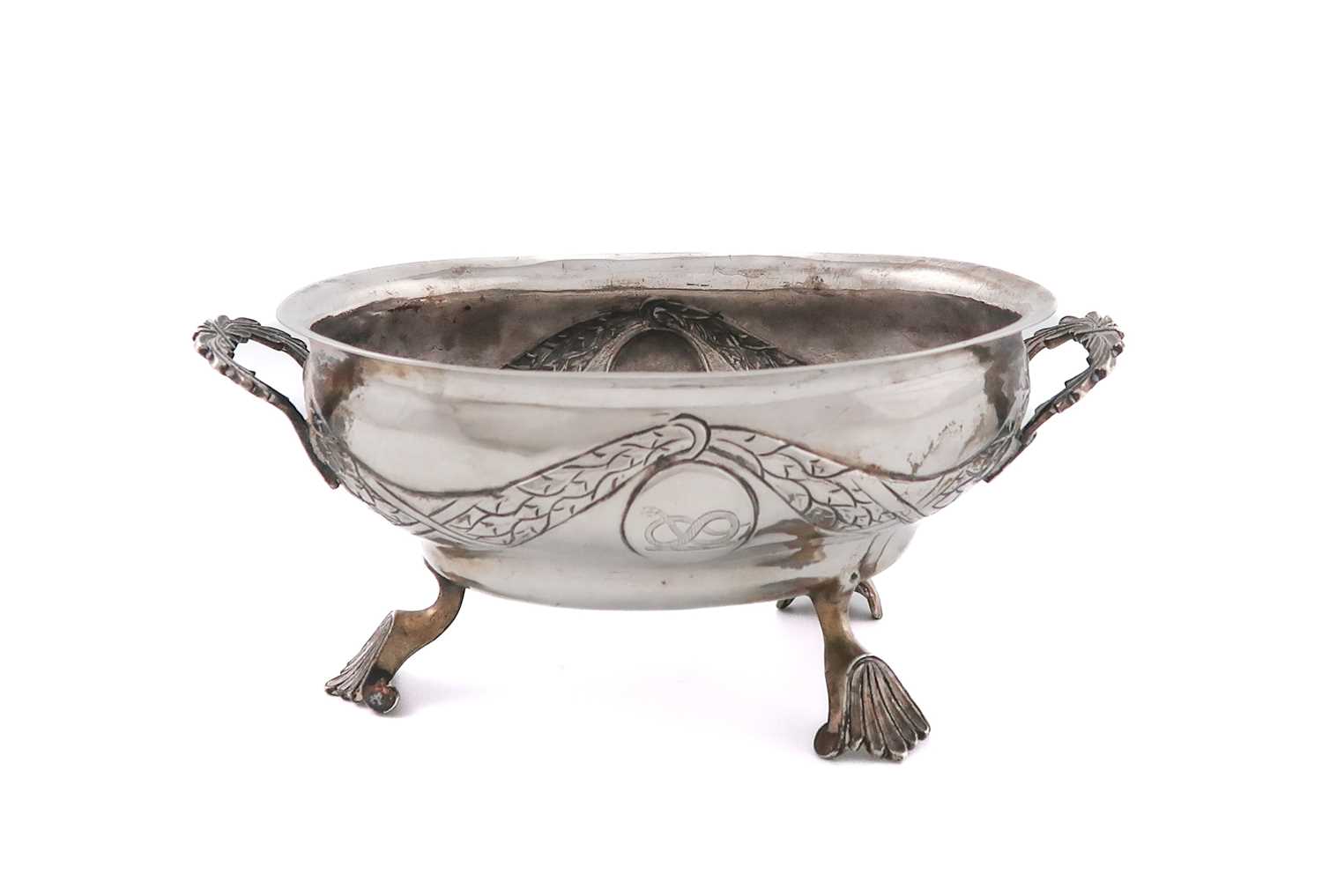 A continental silver two-handled bowl, possibly Swedish, oval form, feather swags, one vacant