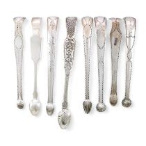 A collection of eight pairs of George III-Victorian Irish silver sugar tongs, Dublin, various