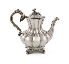 λ A Victorian silver coffee pot, by William Hunter, London 1837, lobed baluster form, a domed hinged