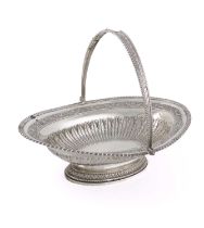 A George III silver swing-handled basket, by Peter, Ann and William Bateman, London 1802, oval form,