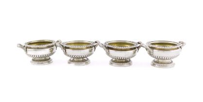 A set of four George III silver salt cellars, by Willliam Eaton, London 1828, circular urn form,