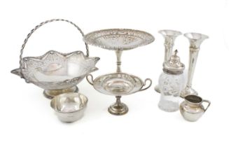 A mixed lot of silver items, comprising: a pierced tazza, Sheffield 1913, a pierced swing-handled