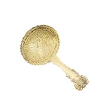 A George IV silver-gilt caddy spoon, by John Bettridge, Birmingham 1824, the oval bowl, with a