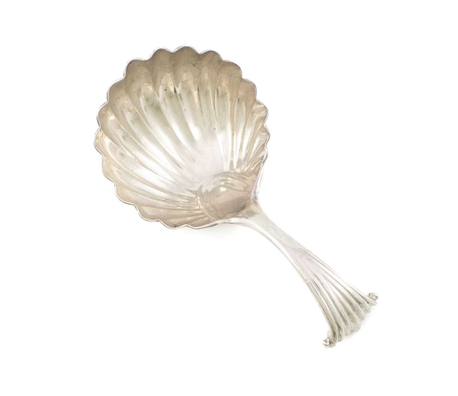 A George III silver Onslow pattern caddy spoon, unmarked, circa 1770, shell bowl, the reverse of the