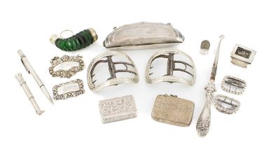 A mixed lot of silver objects of vertu, comprising: four buckles, two vesta cases, two wine